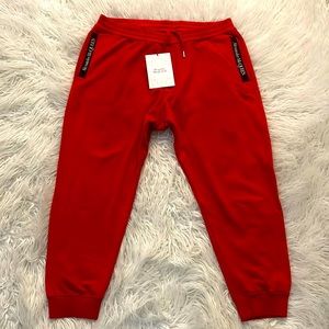 100% authentic Men’s Alexander McQueen Red lust black logo jogger pants 😎🔥
